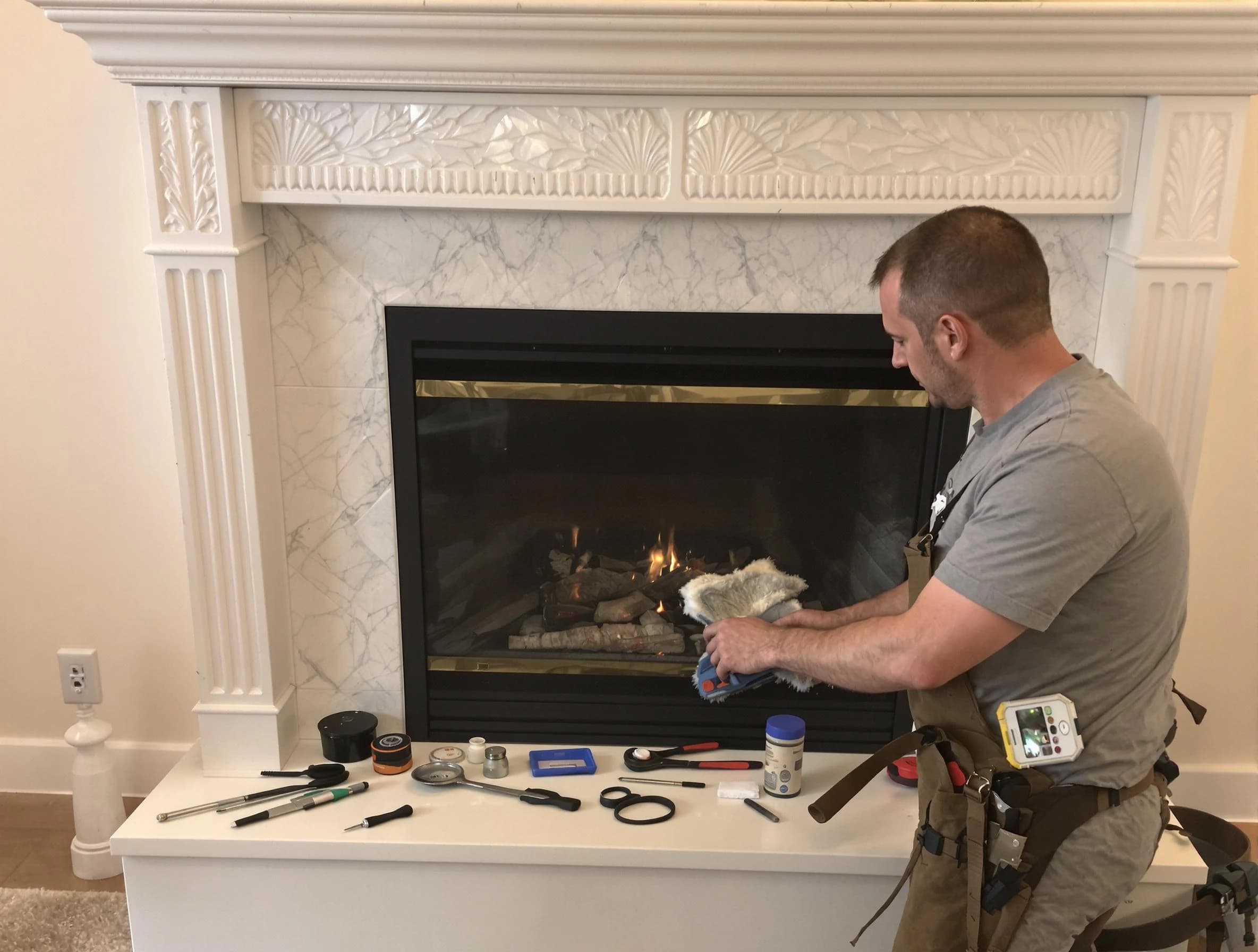 White Oak Chimney Sweep performing fireplace maintenance in White Oak, PA